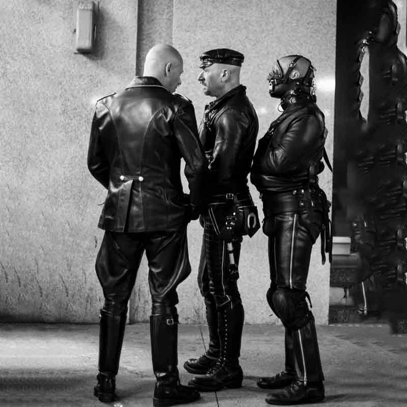 group of old guard leathermen standing